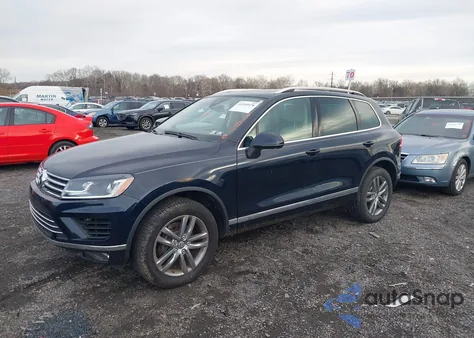 2015 Volkswagen Touareg V6 Lux from USA, damaged, VIN WVGEF9BPXFD006811